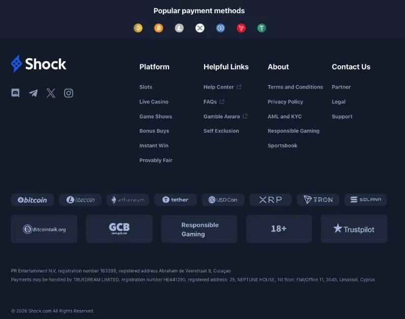 Shock footer with the eight supported cryptocurrencies, the Curacao Gaming Control Board seal and the PR Entertainment N.V. company details